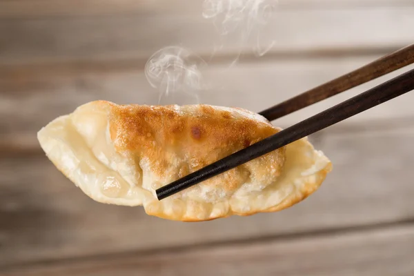 Chinese meal pan fried dumplings — Stock Photo, Image