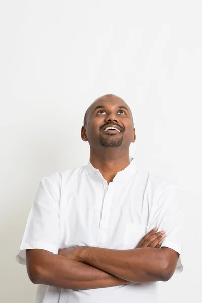 Mature Indian man looking up — Stock Photo, Image