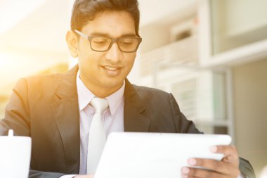 Business man, tablet pc and coffee