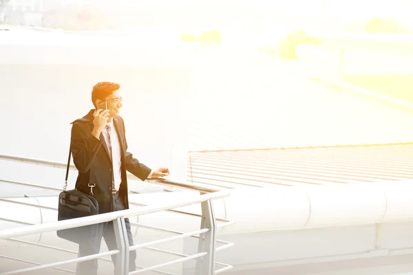 Businessman using smartphone at outdoor — Stock Photo, Image