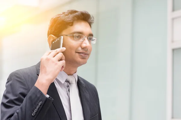 Asian Indian businessman on the phone — Stok fotoğraf