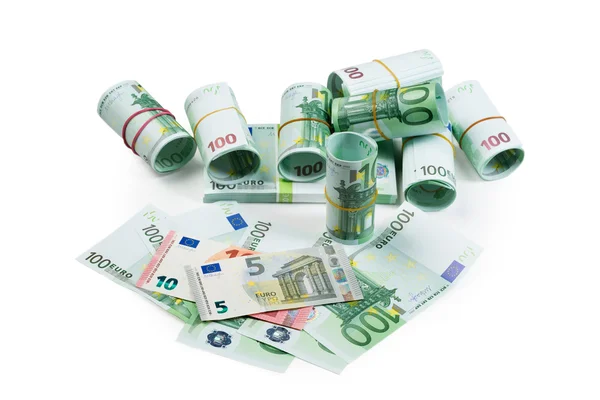 Euro banknotes in stacks and rolls — Stock Photo, Image