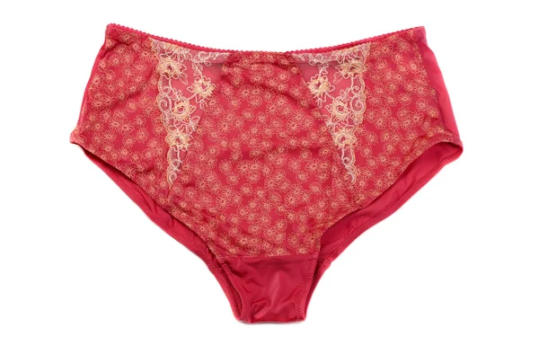 Červené a zlaté saténové kalhotky ženy. — Stock fotografie