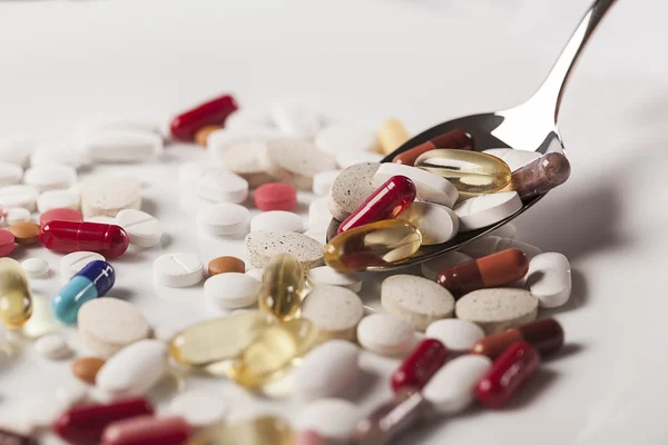 Colorful capsules and pills — Stock Photo, Image