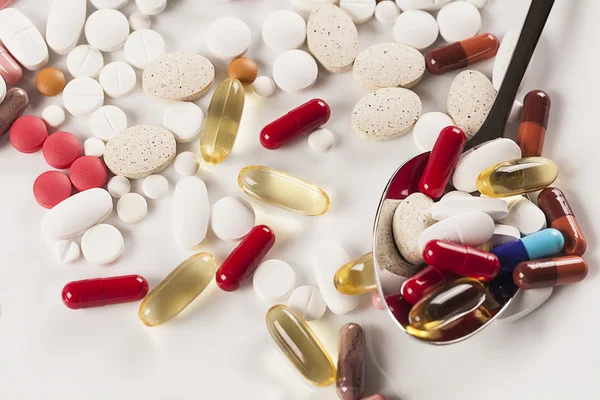 Colorful capsules and pills — Stock Photo, Image