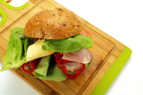 Sandwich on the board to make cutting — Stock Photo, Image