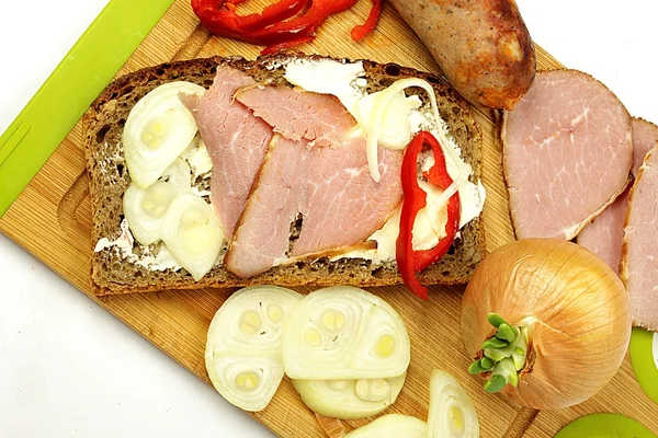 Sandwich with ham and onions — Stock Photo, Image