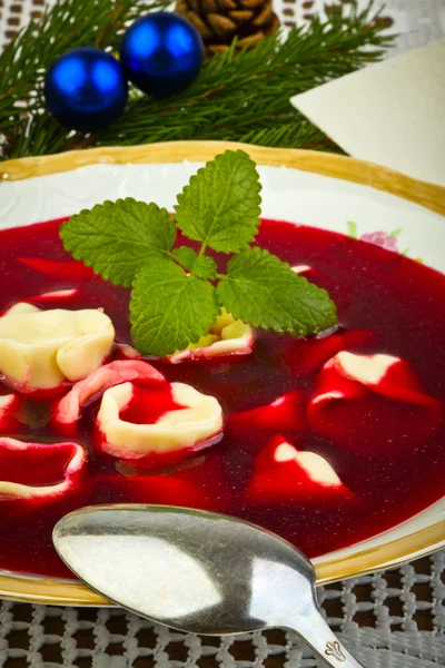 Traditional Christmas borscht with mushrooms filled in dumplings — Stock Photo, Image