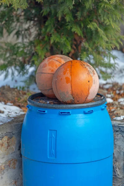 Two Basketballs Top Blue Plastic Barrel — Stock Photo, Image