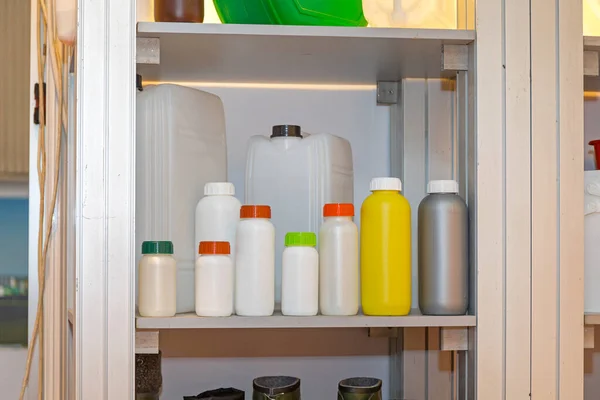 Various Plastic Bottles Storage Room Shelf — Stockfoto