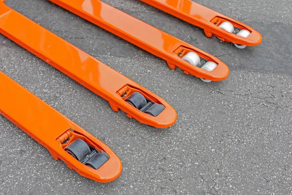 Long Orange Forks Wheels Pallet Jack — Stock Photo, Image