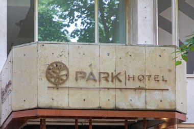 Belgrade, Serbia - June 11, 2021: Abandoned Building Recession Park Hotel Sign Ruin.