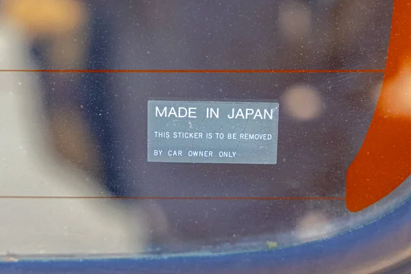 Faded Sticker Made Japan Bij Old Car Glass — Stockfoto