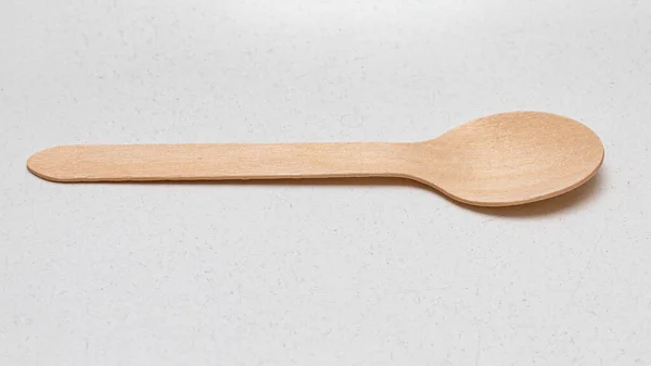 One Wooden Biodegradable Spoon White Table — Stock Photo, Image