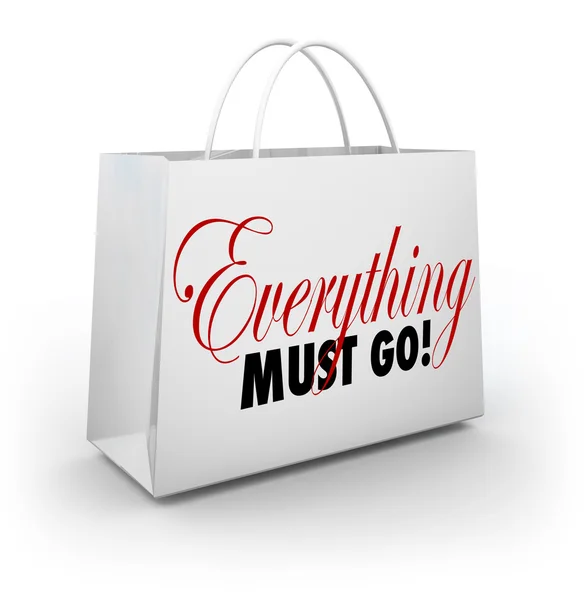 Everything Must Go words on a white shopping bag — Stock Photo, Image
