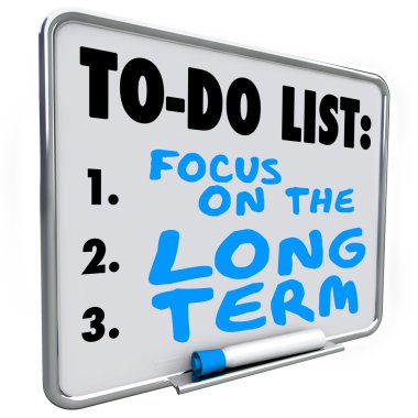 Focus on the Long Term words written on a dry erase board clipart