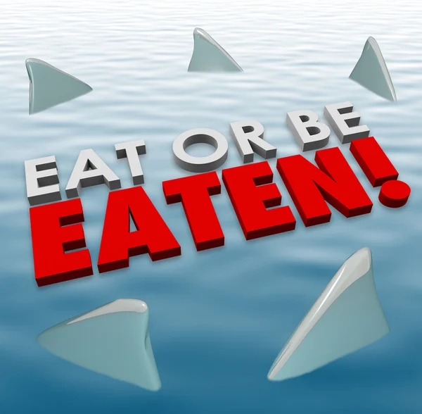 Eat or Be Eaten words on water surface — Stock Photo, Image