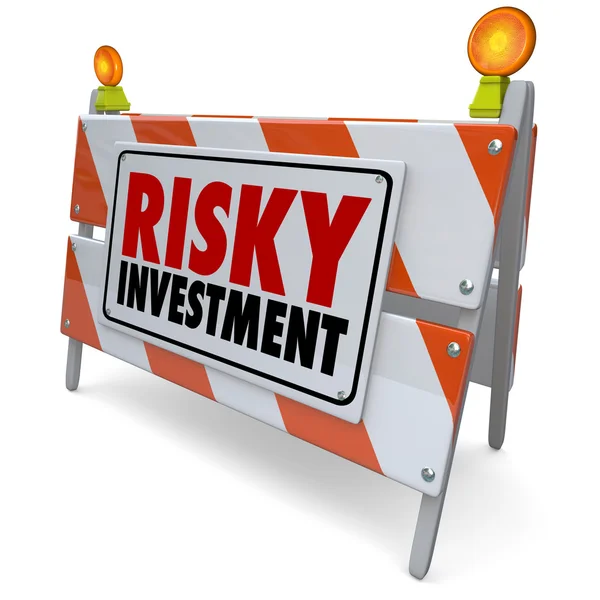 Riskfyllda investeringar ord på ett hinder — Stockfoto