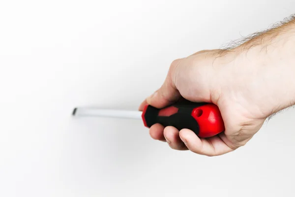 Screwdriver in the hand — Stock Photo, Image