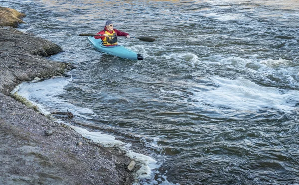 Male paddler in a whitewater kayak — Stock Photo, Image