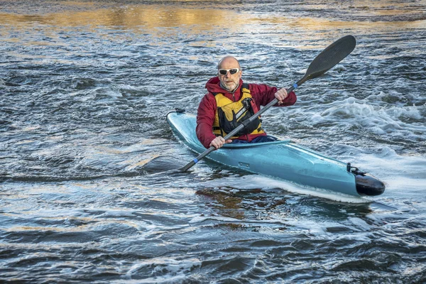 Senior male paddler kayaking — Stock Photo, Image