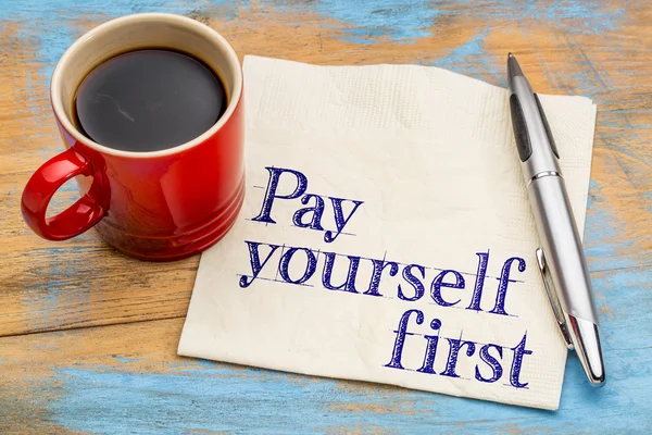 Pay yourself first - text on napkin — Stock Photo, Image