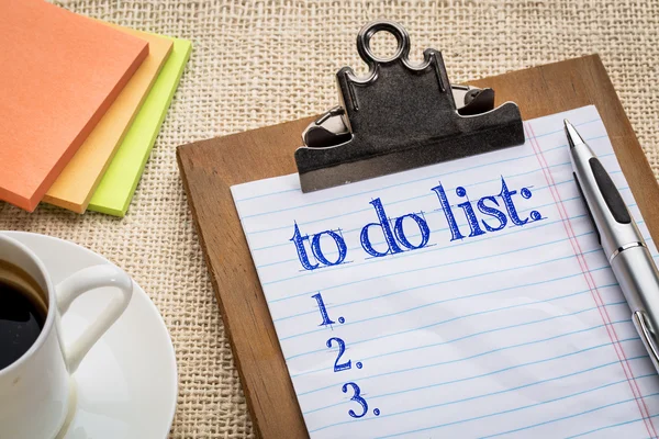 To do list on clipboard and coffee — Stock Photo, Image