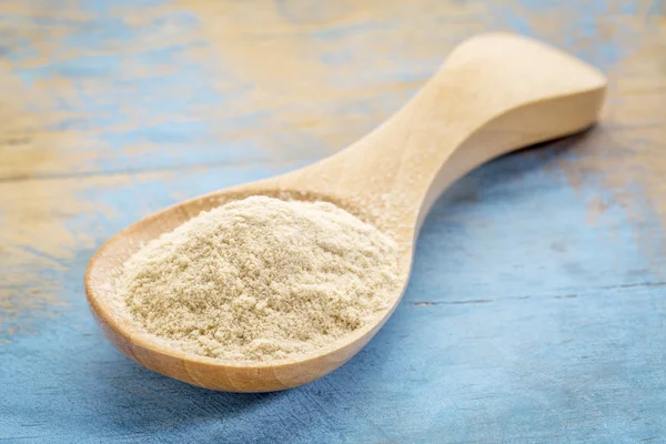 Baobab fruit powder on wooden spoon — Stock Photo, Image