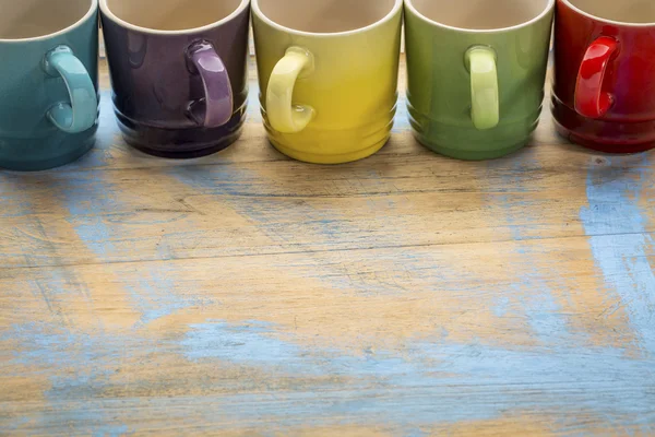 Colorful stoneware coffee cups — Stock Photo, Image