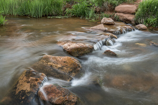 trail crossing mountain creek