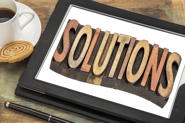 Solutions word in on digital tablet — Stock Photo, Image
