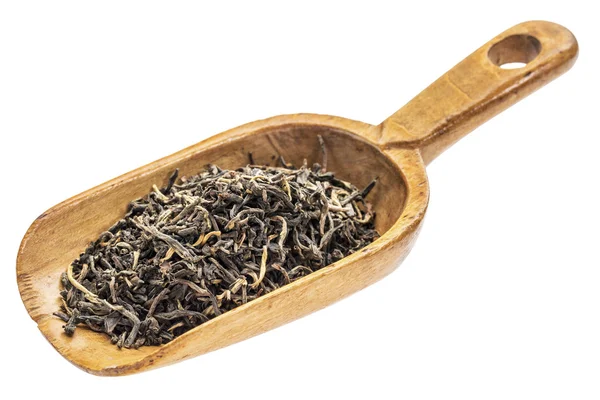 Rustic scoop of black tea — Stock Photo, Image