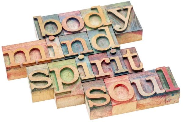 Body, mind, spirit and soul concept in wood type — Stock Photo, Image