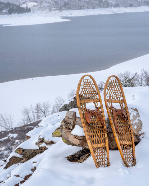 classic snowshoes in winter scenery of Horsetooth Reservoir in northern Colorado