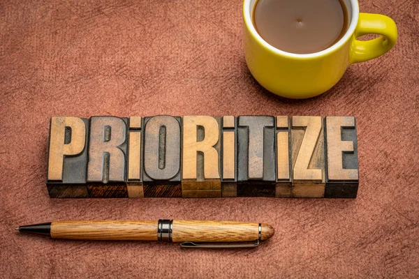 Prioritize Motivational Word Abstract Vintage Letterpress Wood Type Cup Coffee — Stock Photo, Image