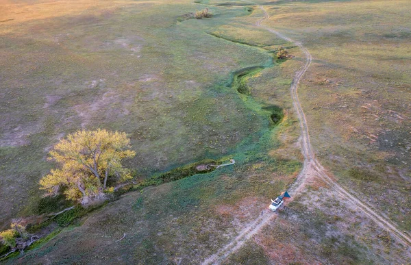 Aerial View Green Prairie Seasonal Creek Suv Car Dirt Road — Stock Photo, Image