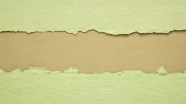 Fotokopi alanı olan yeşil ve bej renkli kağıt özeti. El yapımı kağıt sayfaları, boş web pankartı.