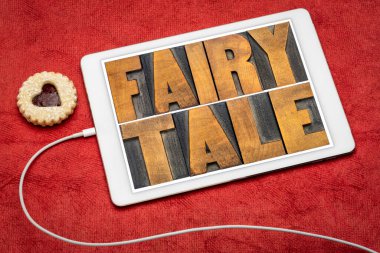 Peri masalı - dijital tablet üzerindeki eski harf baskı ahşap yazısıyla soyut sözcük