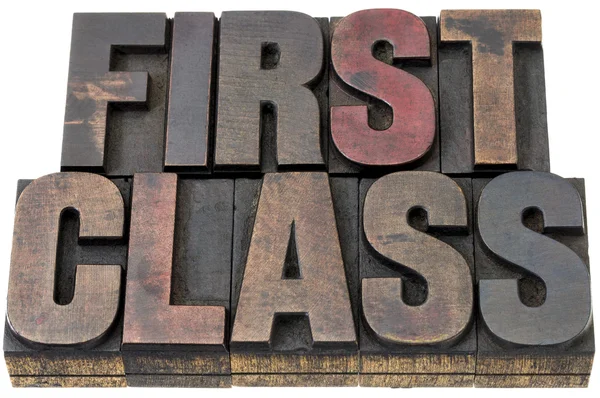 First class in wood type — Stock Photo, Image