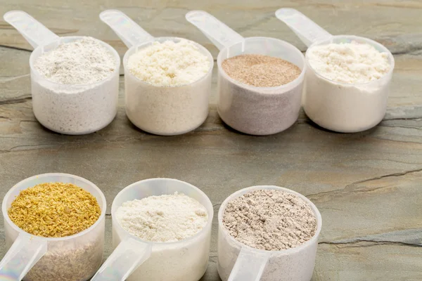 Scoops of gluten free flour Stock Photo