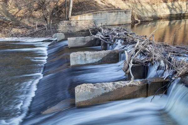Old river dam on Poudre River — Stock Photo, Image