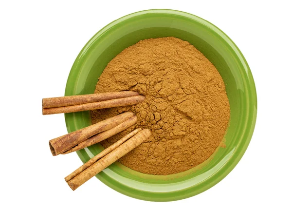 Cinnamon (cassia)  powder and sticks — Stock Photo, Image