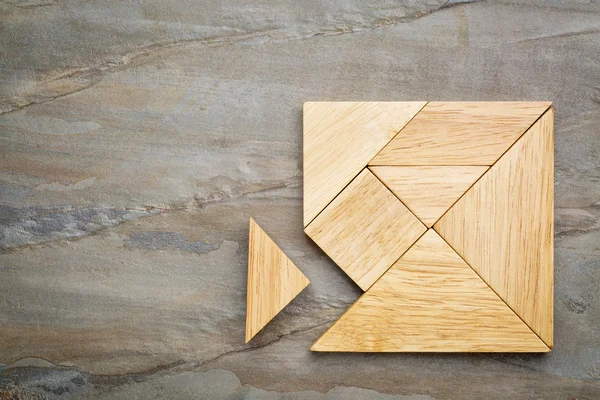 Ontbrekende stuk in tangram puzzel — Stockfoto