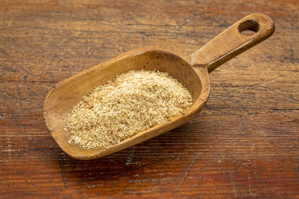 Bolletje gouden lijnzaad maaltijd — Stockfoto