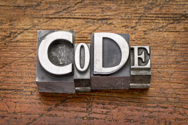 Palavra código em tipo de metal — Fotografia de Stock