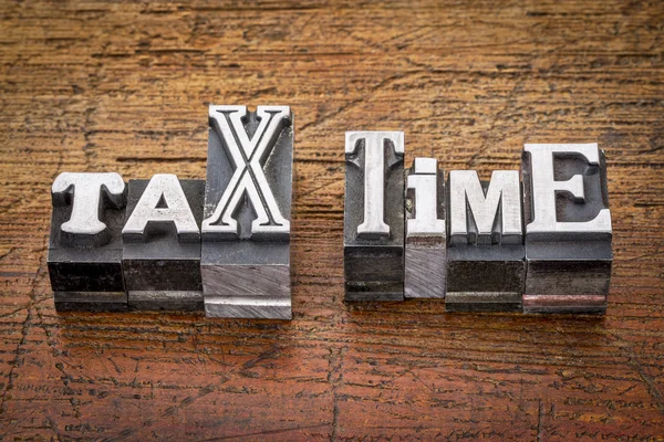 Tax time in metal type — Stock Photo, Image