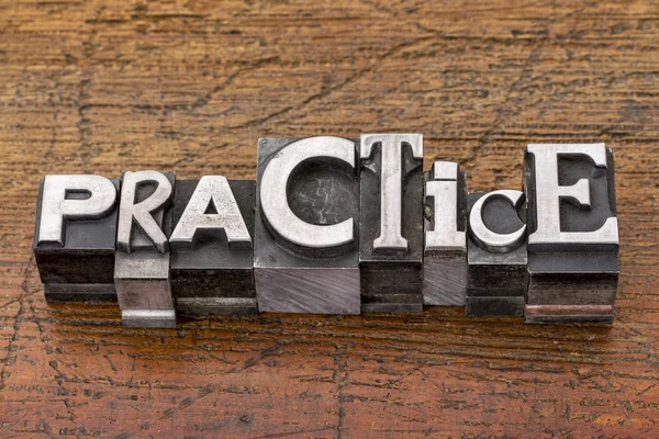 Practice word in metal type — Stock Photo, Image