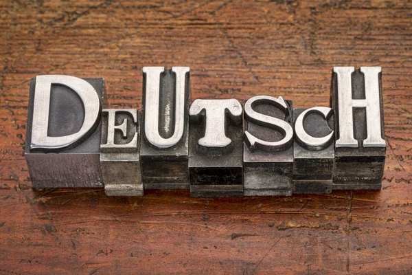 Deutsch word in metal type — Stock Photo, Image