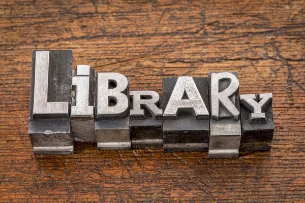 Palavra biblioteca em tipo de metal — Fotografia de Stock