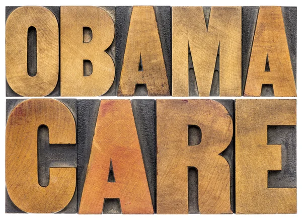 ObamaCare typografie in houtsoort — Stockfoto